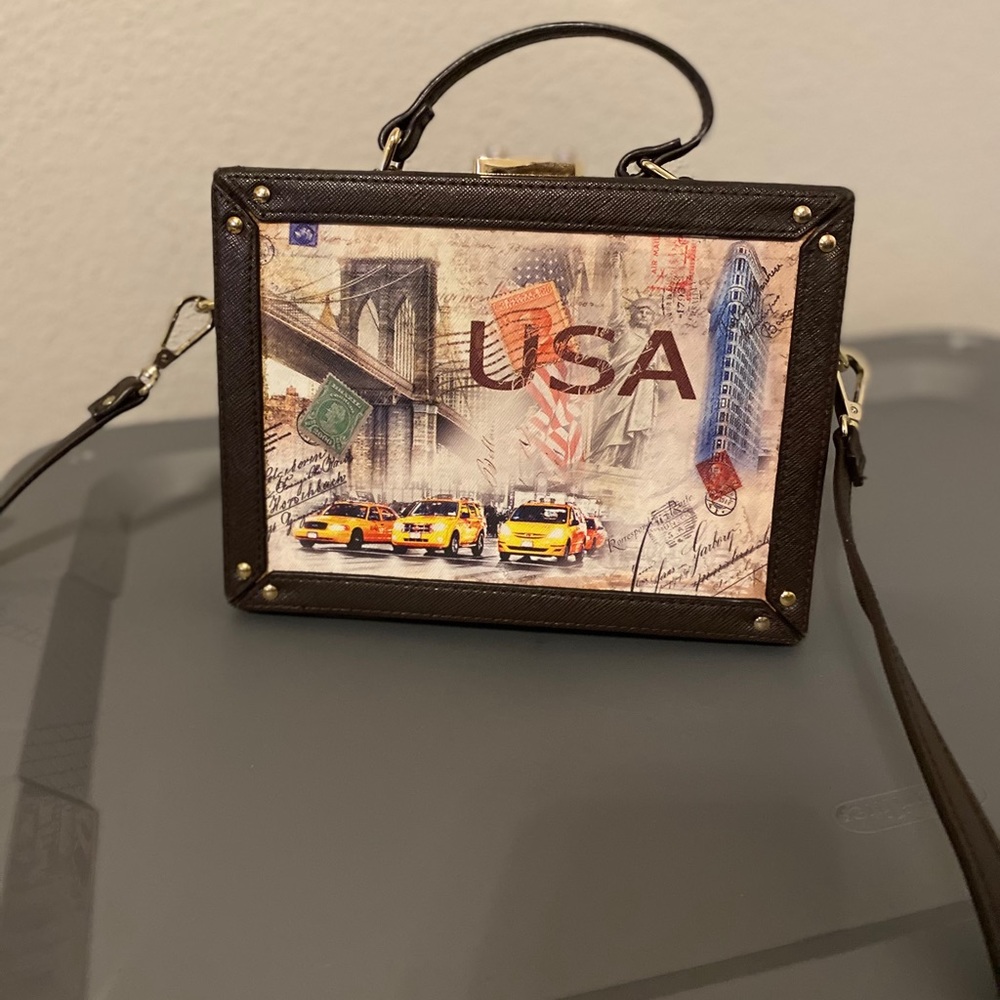 brown box purse with lock/key